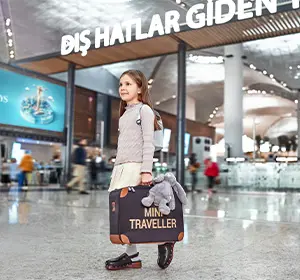 a kid walking in international departure in istanbul airport